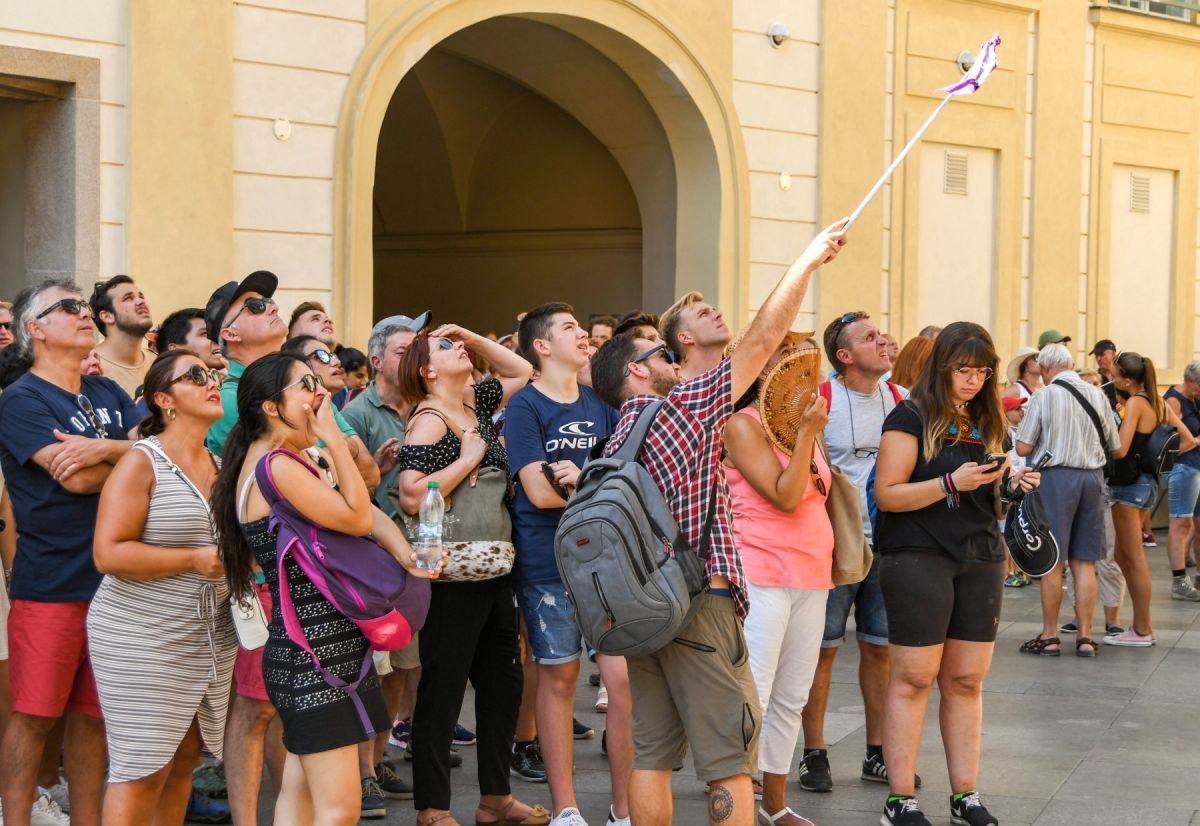 Tour guide during city orientation walking tour in Prague